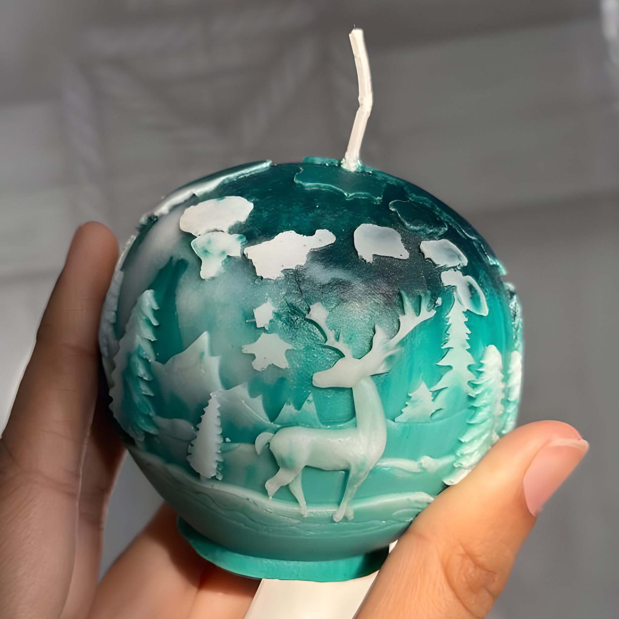 Christmas ball candle with 3D reindeer winter forest carving