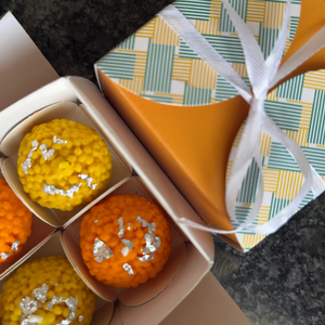 Mithai-style ladoo candles for Diwali pooja room and thali decoration.
