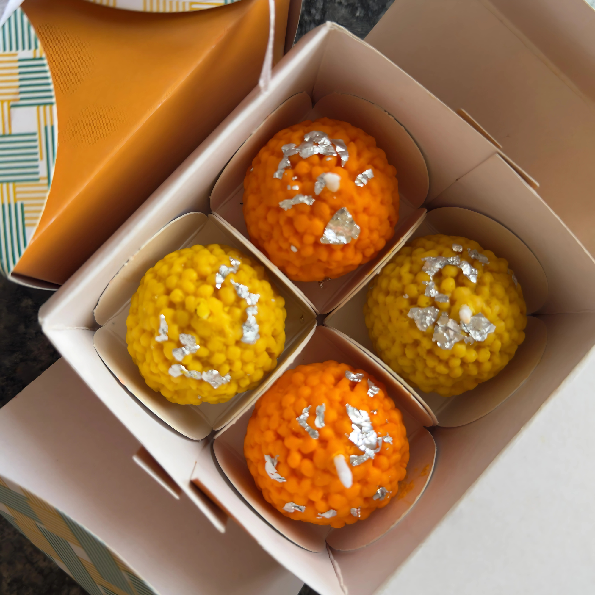💼 Corporate Diwali Hampers – Perfect for employee gifting, festive hampers, and bulk orders.

💡 Unique Diwali Gift Items – Stand out from regular sweets with mithai-shaped scented candles. cardboard box.