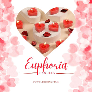 "Romantic red heart candles from Euphoria Gifts, ideal for Valentine's Day, anniversary decorations, and gifting – elegant setup with rose petals and tealights" Heart-shaped candles with red candles on a white background, surrounded by pink heart-shaped decorations, featuring the brand 'Euphoria Candles'.