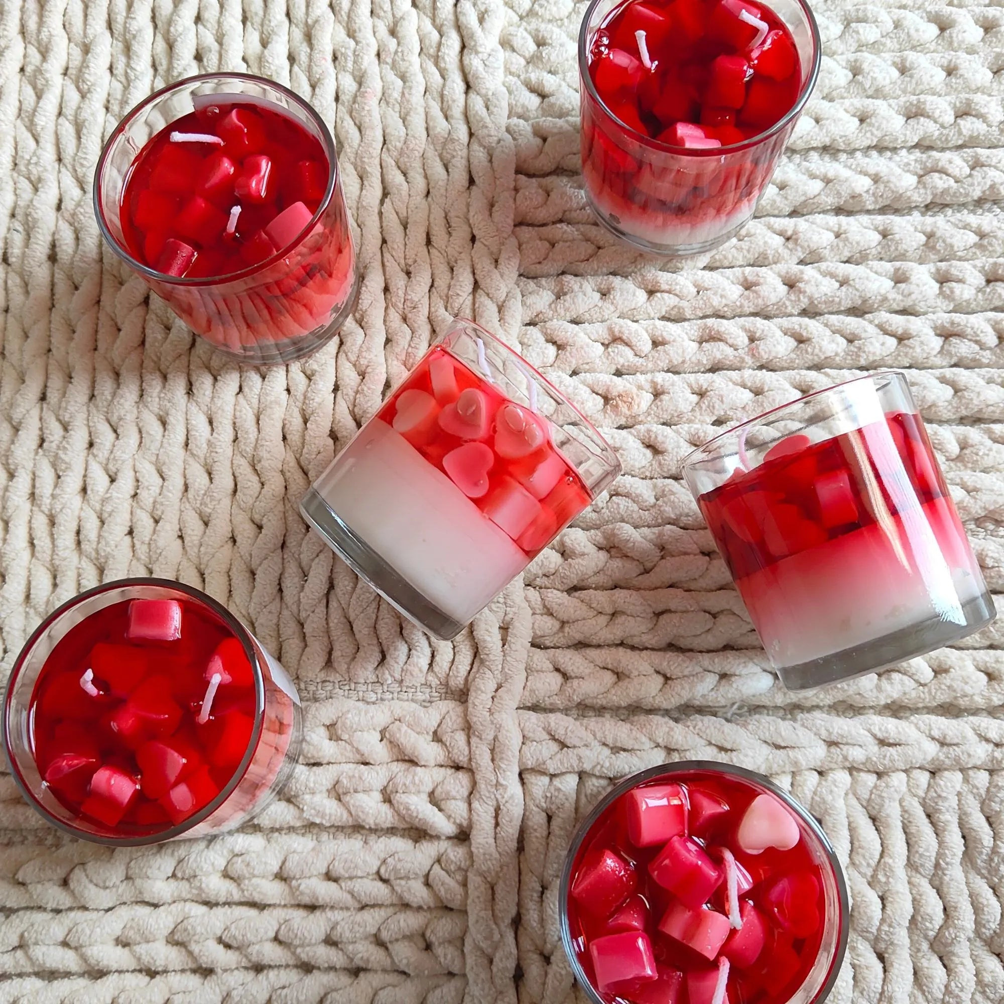 Flatlay of heart jar gel wax candles with Euphoria Gifts branding