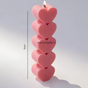 15cm tall pink heart pillar candle from Euphoria Gifts, showcasing its sculptural design and elegant height
