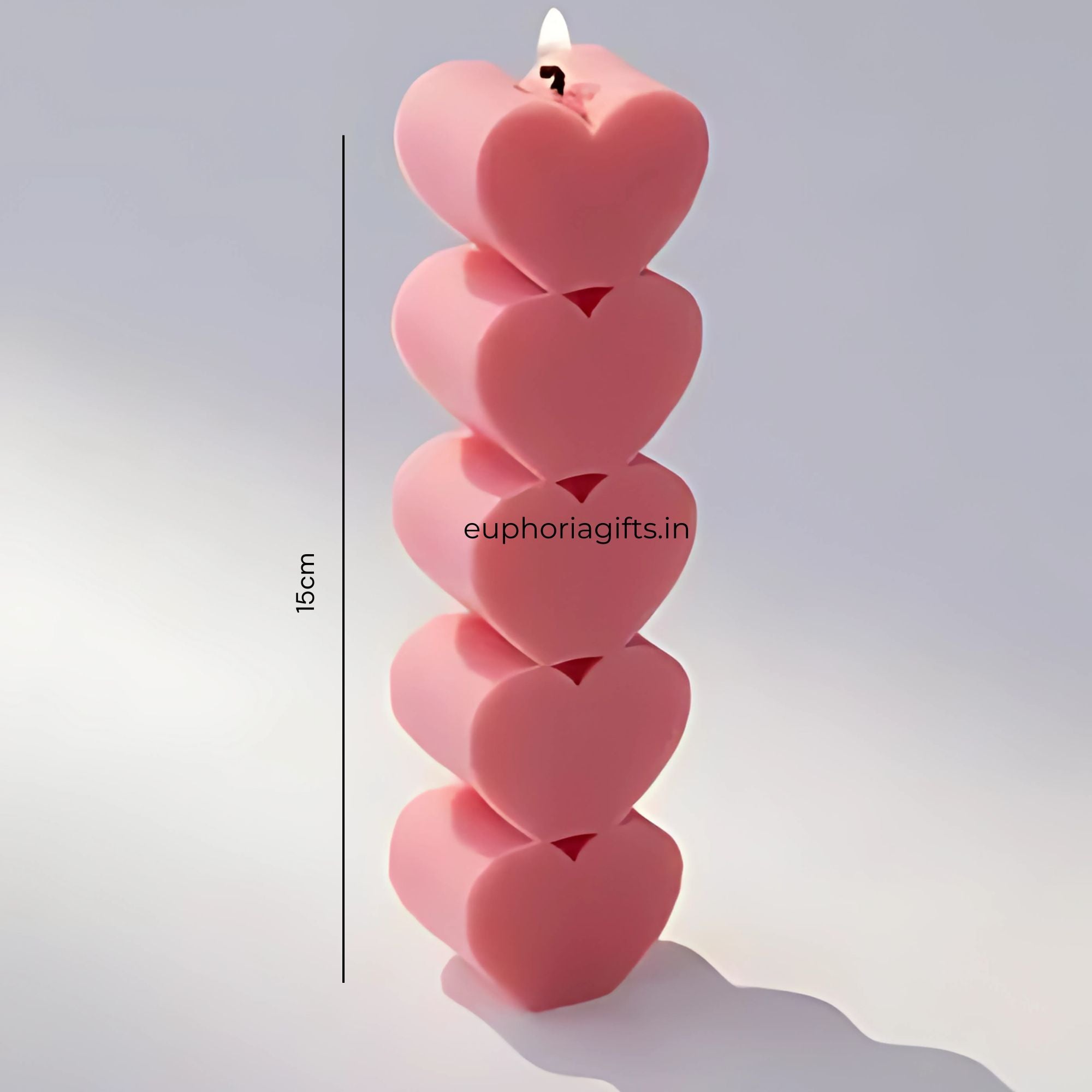 15cm tall pink heart pillar candle from Euphoria Gifts, showcasing its sculptural design and elegant height