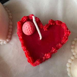 heart-shaped cake candle made from natural soy wax, with red center and white frosting-like edges. birthday cake candle , strawberry cake candle, candle for valentines day 